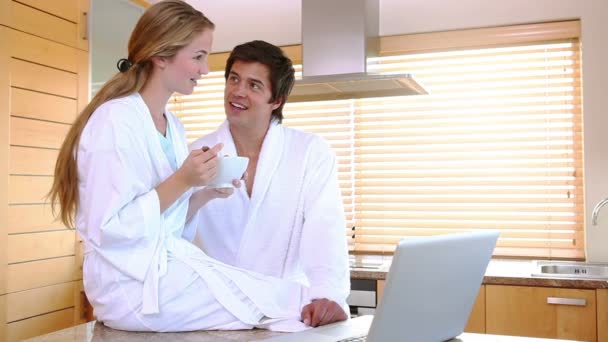 Couple in bathrobes on a video chat — Stock Video