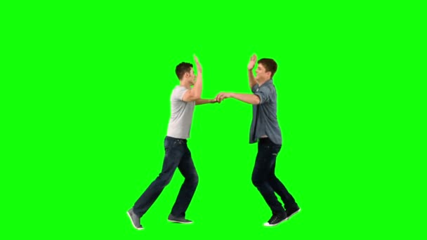 Friends giving high-five in slow motion — Stock Video