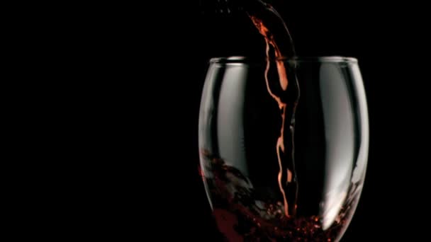 Red wine being poured in super slow motion — Stock Video