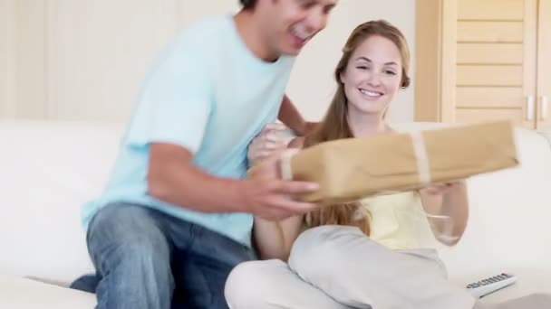 A couple receiving a package — Stock Video