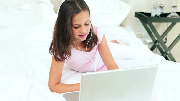 Young girl looking at her laptop — Stock Video