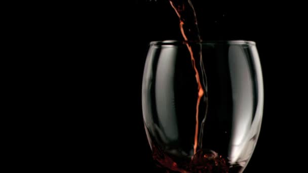 Red wine being poured in super slow motion — Stock Video