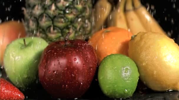 Water dripping on fruit in super slow motion — Stock Video