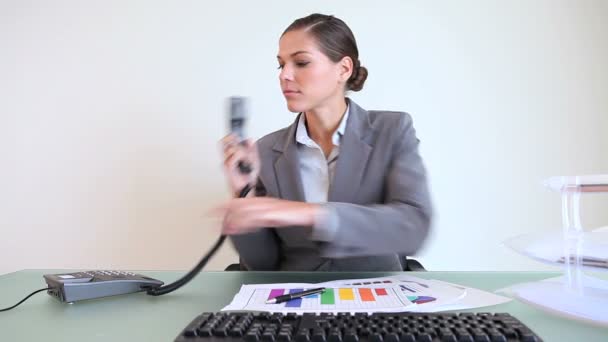 Businesswoman checking documents — Stock Video