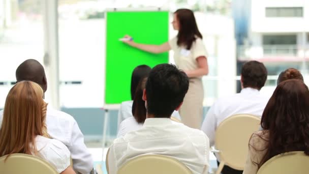 Businesswoman showing a board — Stock Video