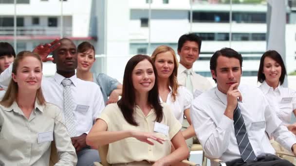 Two business people raising their hands — Stock Video