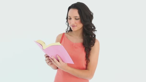 Girl reading her book — Stock Video