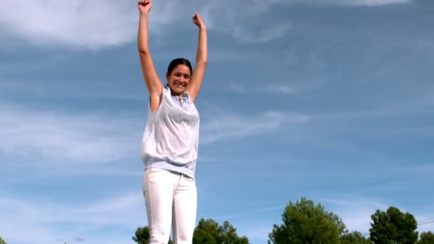 Adult jumping on a trampoline — Stock Video