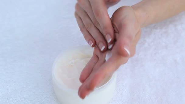 Woman moisturising hands — Stock Video