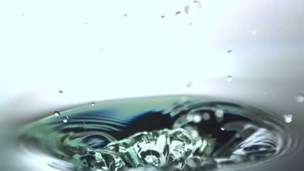 Stone falling in water — Stock Video