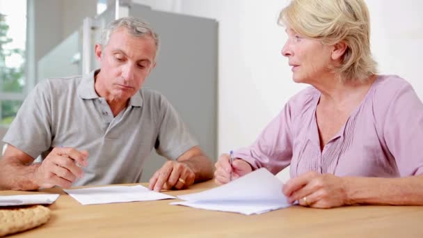 Couple signing documents together — Stock Video