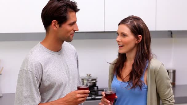 Couple toasting in kitchen — Stock Video