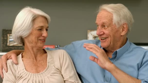 Elderly couple laughing in home Video Clip