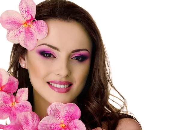 Bella donna con orchidea — Foto Stock