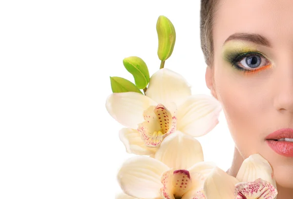 Hermosa mujer con orquídea —  Fotos de Stock