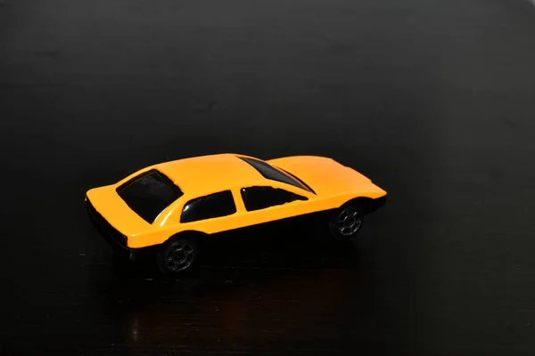 Picture Shows Children Toy Yellow Car Standing Dark Background — Fotografia de Stock