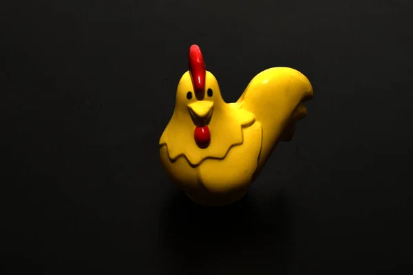 Picture Shows Children Toy Yellow Laying Hen Stands Dark Background — Fotografia de Stock