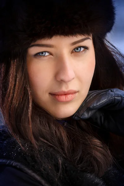 Young beaytiful women in fur hats in winter forest — Stock Photo, Image