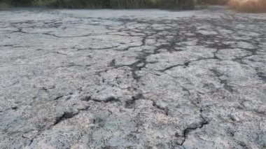 Geology.Dried-up riverbeds and lakes. Drought, global warming and climate change. Cracked dry earth and soil.Dry desert, drought season. Idea concept symbol disaster ecology in nature.
