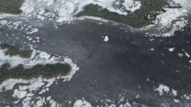 Geology.Dried-up riverbeds and lakes. Drought, global warming and climate change. Cracked dry earth and soil.Dry desert, drought season. Idea concept symbol disaster ecology in nature.