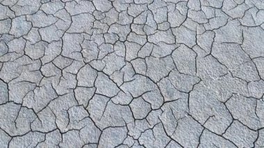 Geology.Dried-up riverbeds and lakes. Drought, global warming and climate change. Cracked dry earth and soil.Dry desert, drought season. Idea concept symbol disaster ecology in nature.