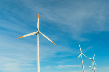 Green energy on wind turbines and wind turbines. Alternative energy sources and renewable energy sources. Power generation and generators of power plants.Wind farm and wind,environmental conservation