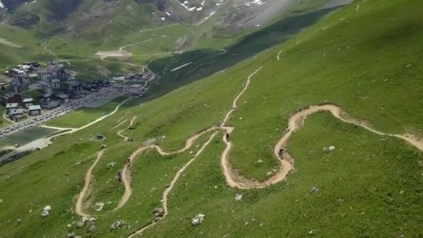 Mountain biker on trail in alps aerial flight - 4k UHD — Stock Video