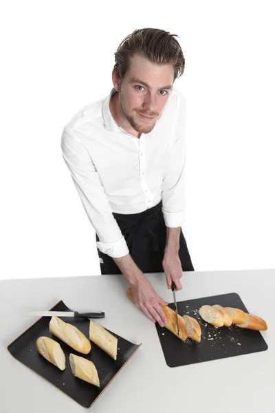 Chef slicing bread — Stock Photo, Image
