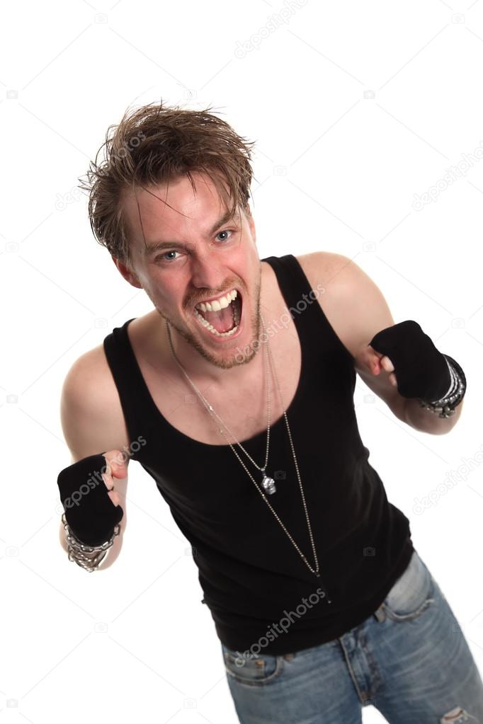 Rocker dude with raised fists