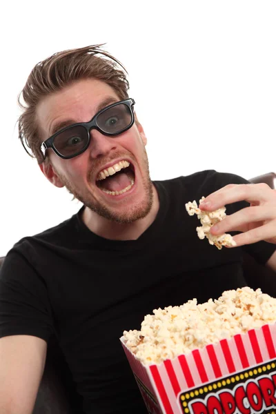 Happy in 3-D glasses with popcorn — Stock Photo, Image