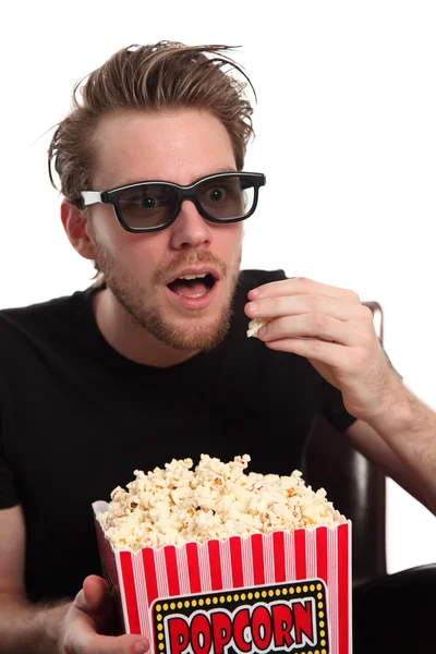 Amazed in 3D-glasses with a popcorn — Stock Photo, Image