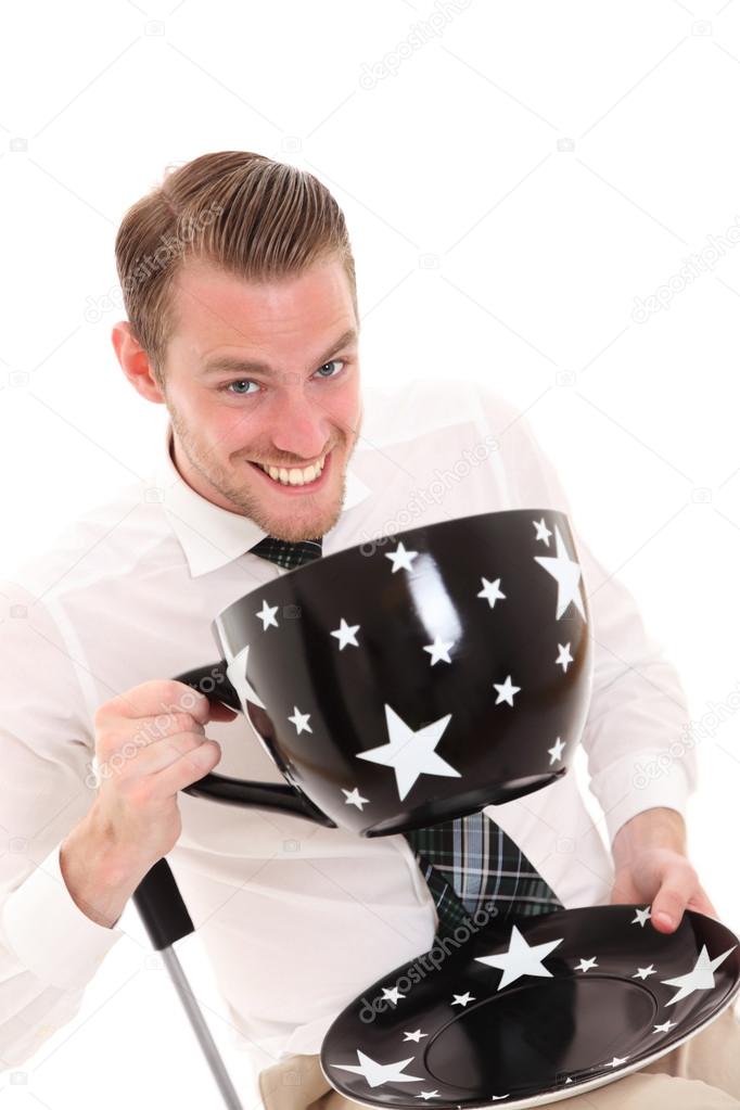 Businessman with a huge coffee cup
