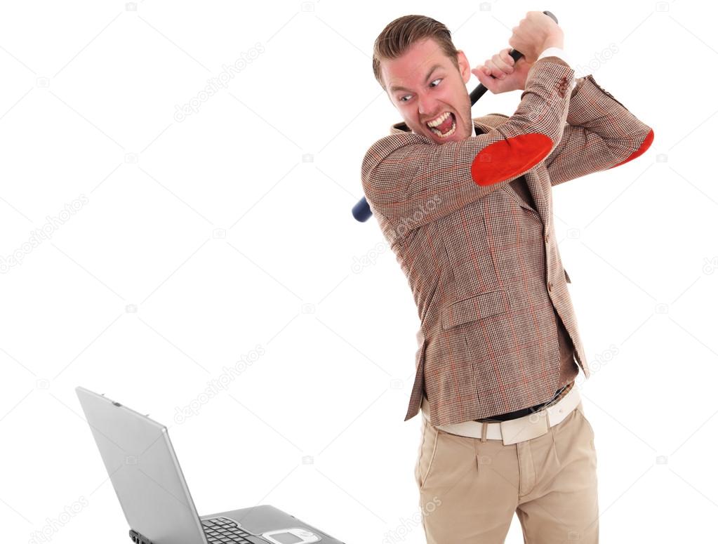 Businessman about to smash a laptop