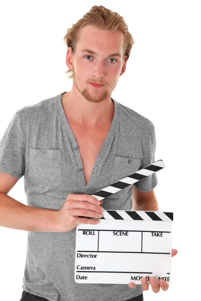 Hombre sosteniendo una pizarra de película —  Fotos de Stock