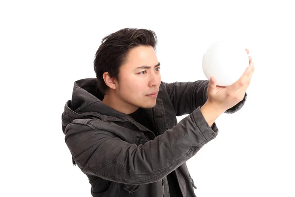 Man looking up into a glass ball — Stock Photo, Image