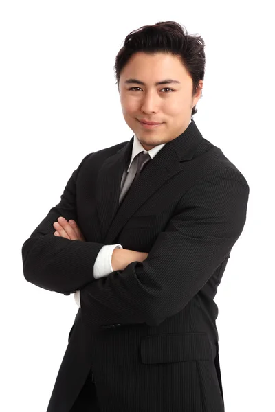 Jeune homme d'affaires en costume et cravate — Photo