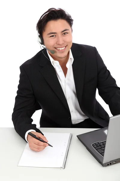 Young man working, with a laptop — Stock Photo, Image