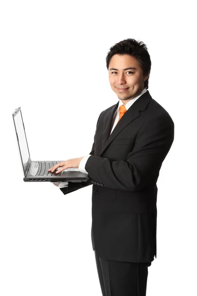 Biznesmen pracuje na swoim komputerze — Zdjęcie stockowe