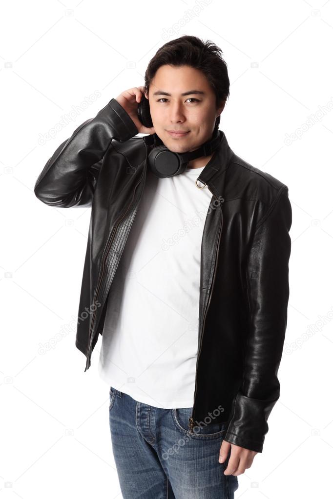 Attractive DJ in leather jacket