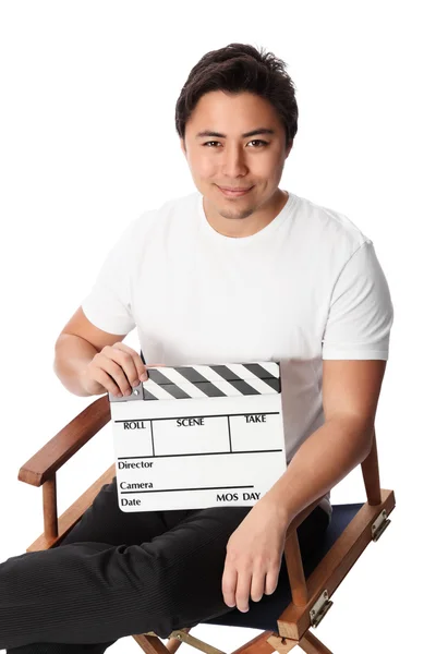 Attraktiver Mann mit Filmtafel — Stockfoto