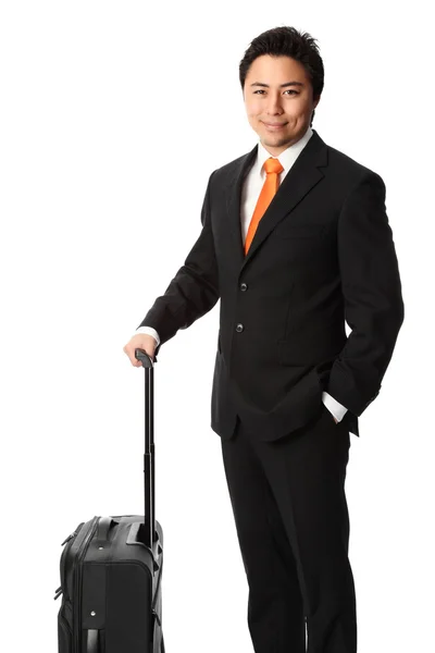 Podnikatel stojící s taškou — Stock fotografie