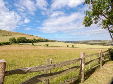 Pastoral South Downs view with fence in foreground, Wilmington, East Sussex, UK - June 2022