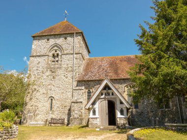 Typical English country church, St Andrews in Jevington, East Sussex, UK - July 2022