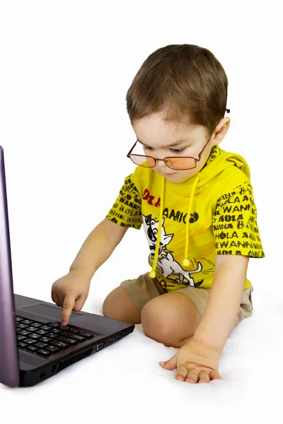 Het kind en de computer Stockafbeelding