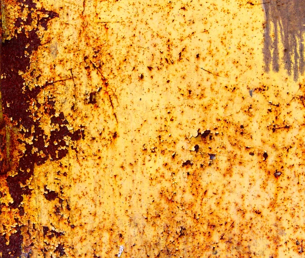 Metallo arrugginito verniciato giallo arancio brillante — Foto Stock