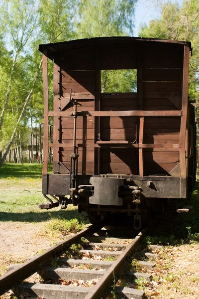 Old rusty train wagon on the station. — Stock Photo, Image