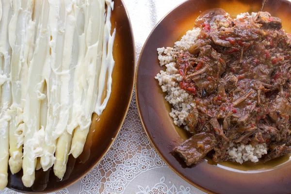 Beef goulash, pearl barley and asparagus with mayonnaise. — Stock Photo, Image