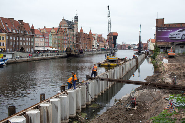 Gdansk, Poland - 24 July 2013 - Inflatables and pile driver during the reconstruction of the quay on the Granary Island in Gdansk, Poland.