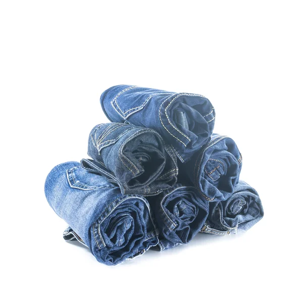 Stapel van warmgewalste jeans — Stockfoto