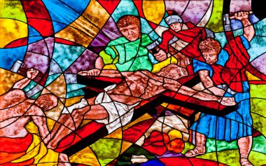 Stained glass showing Jesus crucifixion clipart